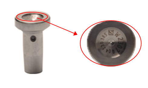 Valve cap return hole location